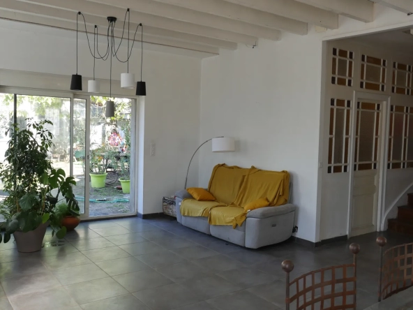 Maison de 188 m2 avec jardin, cave et garage à Montbrison 