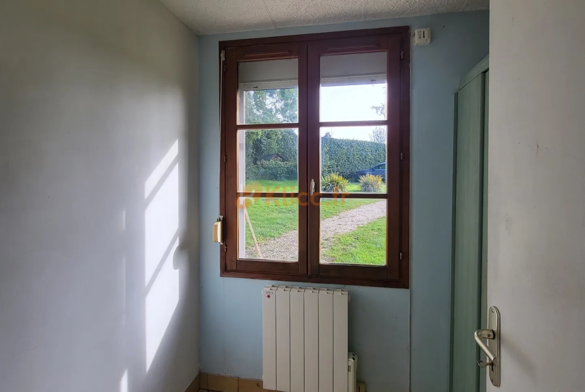 Longère à restaurer dans paisible village 