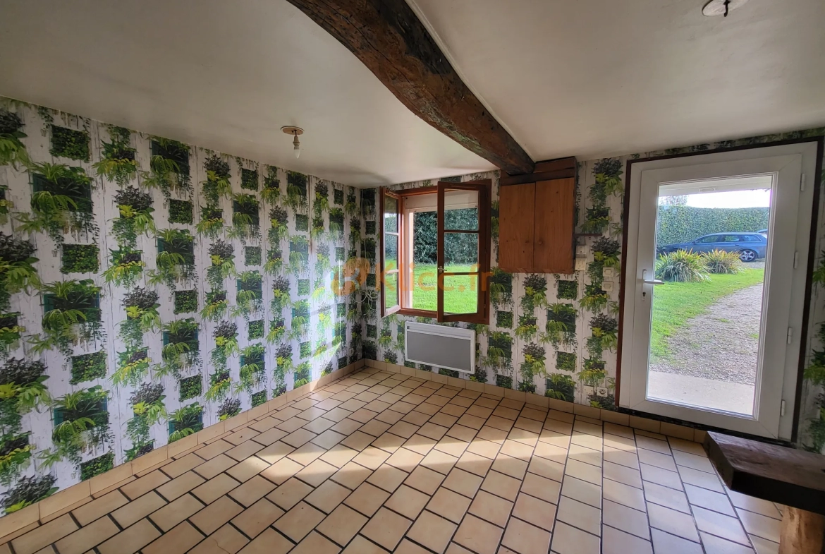 Longère à restaurer dans paisible village 