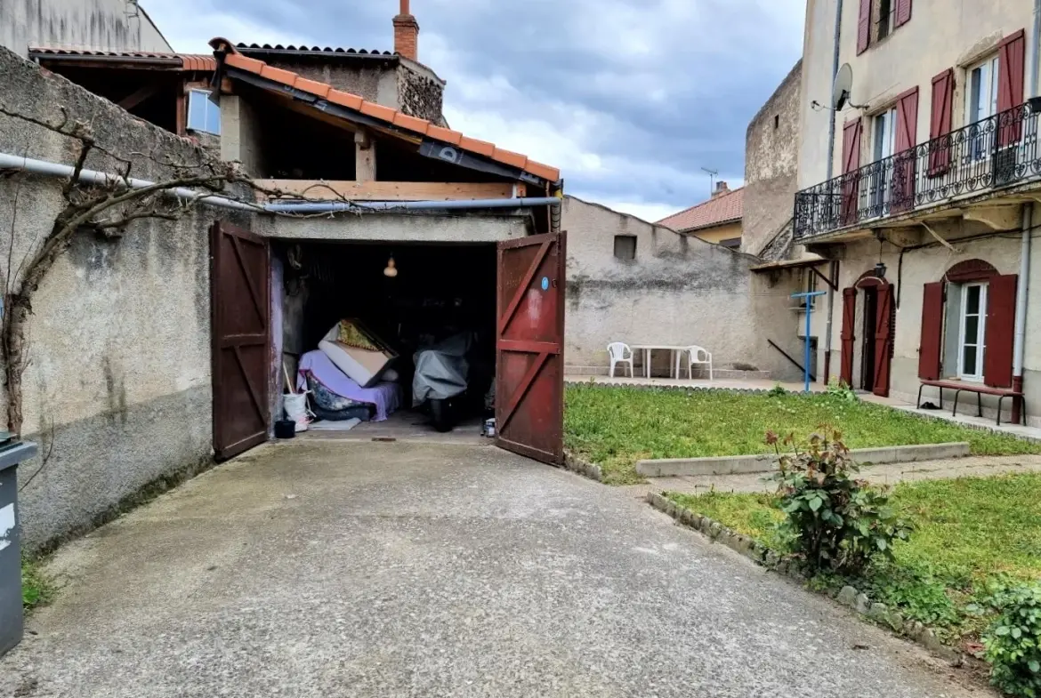 Maison de bourg de 204m2 avec terrain et garage à acheter à Saint-Amant-Tallende avec HP Immobilier 
