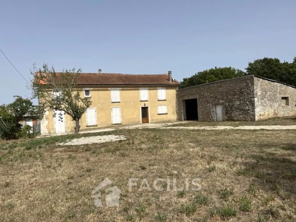 Maison en pierre avec grange et vaste terrain
