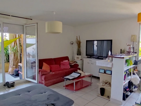 Appartement T2 déjà loué avec terrasse et parking à Carcassonne 