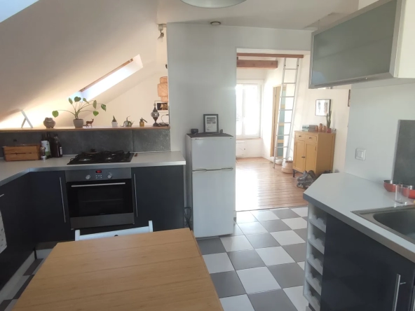 Appartement Dernier étage poutres apparentes 