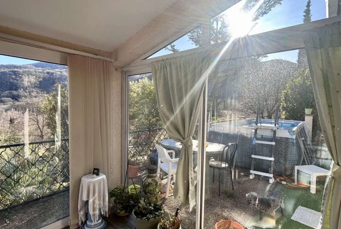 Maison 4 faces de plain pied avec garage et jardin à Arles sur Tech 