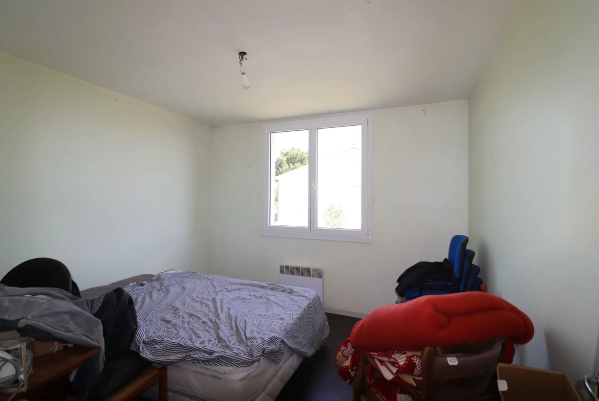 Médis maison - Maison de plain-pied avec trois chambres et garage 