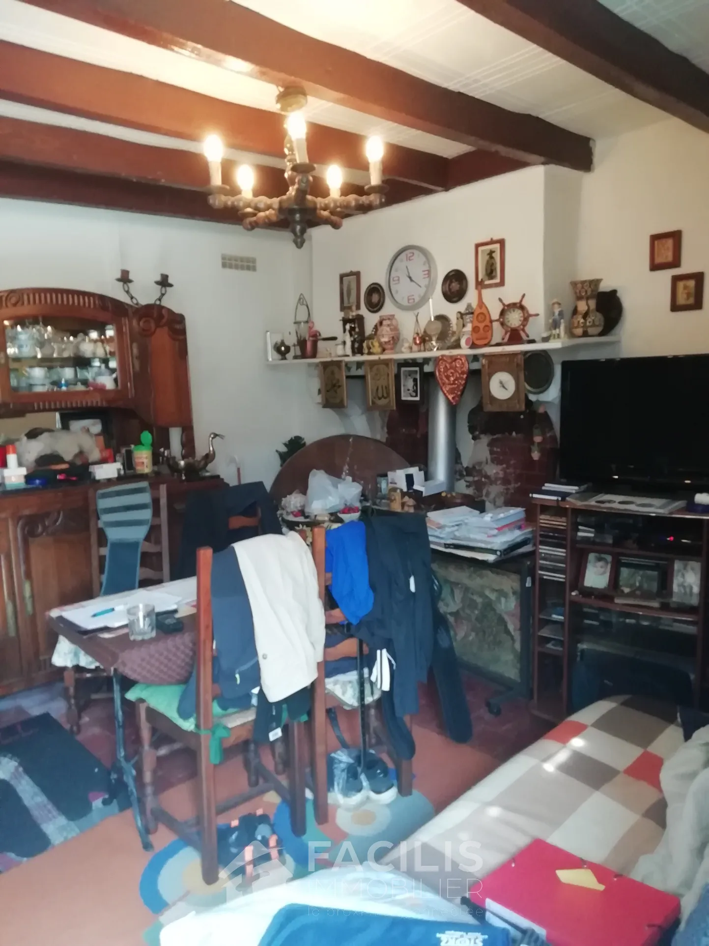 Maison de village type F2 de plain-pied avec jardin 