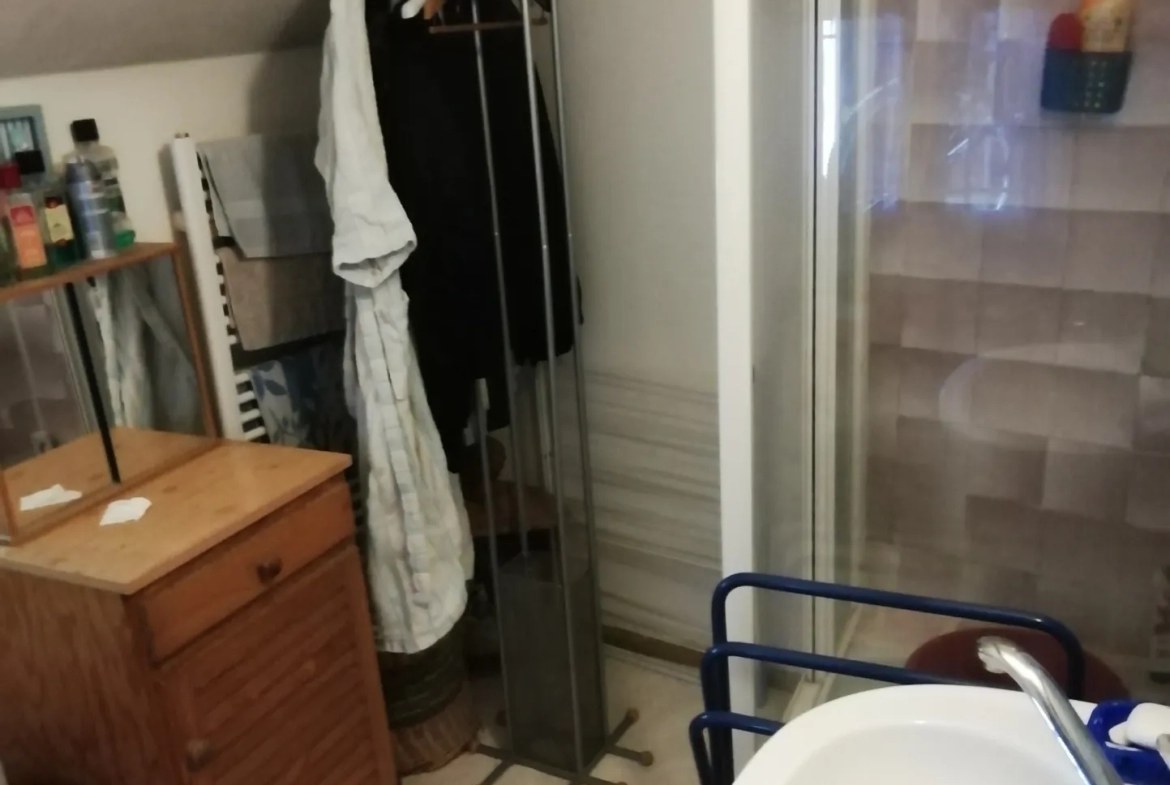 Maison de village type F2 de plain-pied avec jardin 