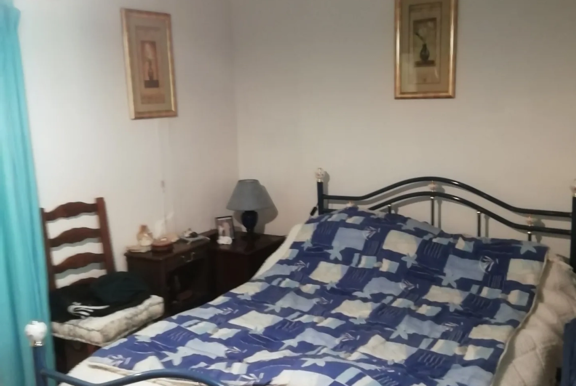Maison de village type F2 de plain-pied avec jardin 
