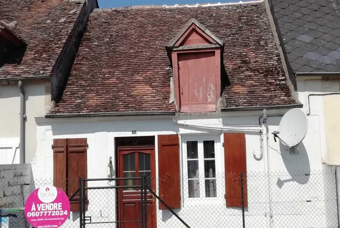 Maison de village type F2 de plain-pied avec jardin 