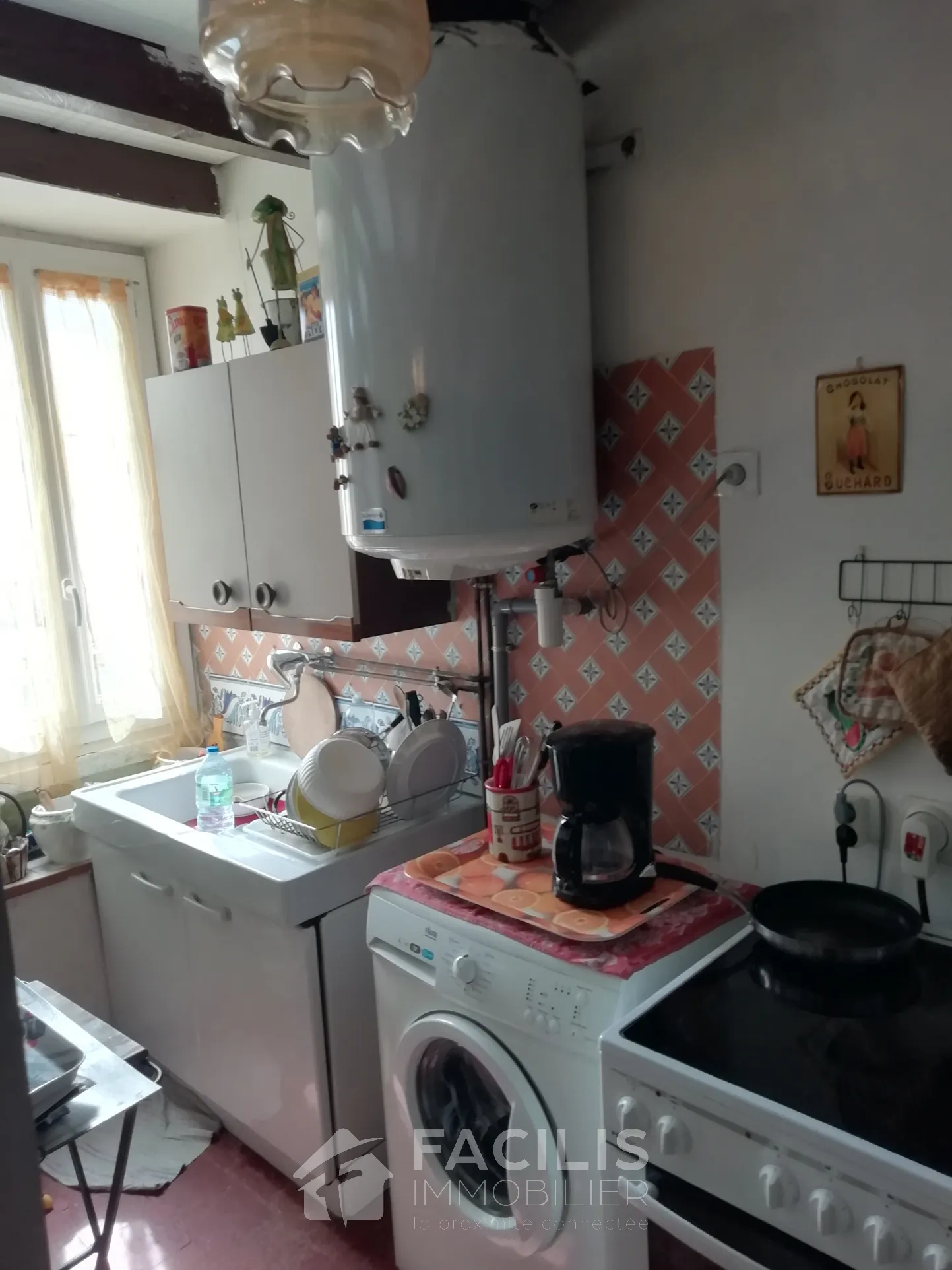Maison de village type F2 de plain-pied avec jardin 