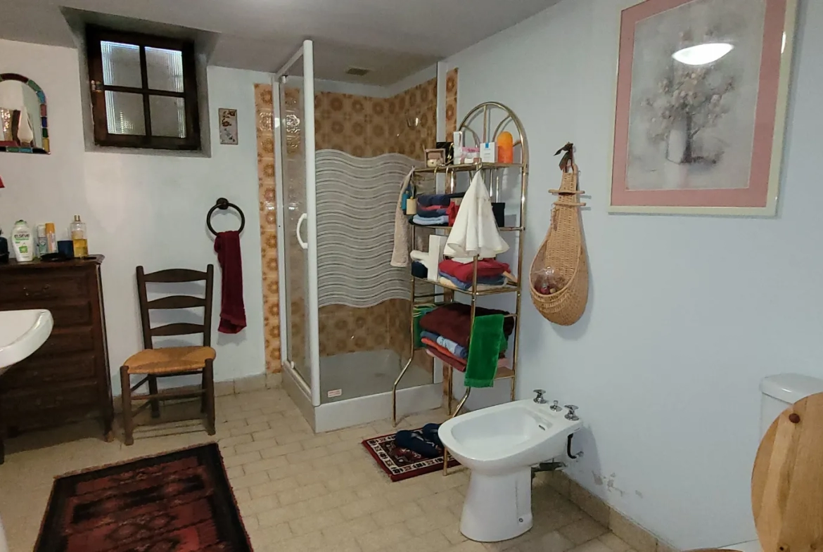 Ensemble de 2 maisons mitoyennes avec jardin et garage 