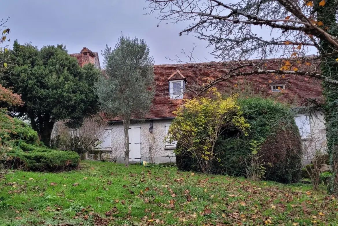 Ensemble de 2 maisons mitoyennes avec jardin et garage 