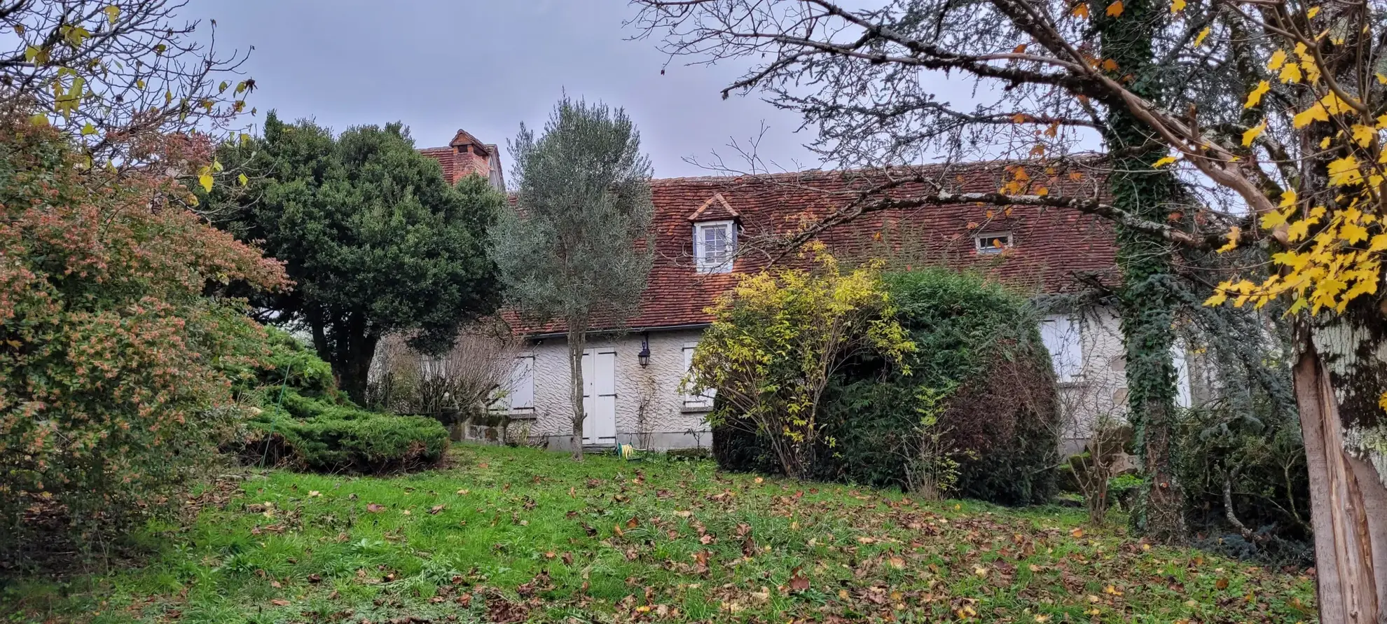 Ensemble de 2 maisons mitoyennes avec jardin et garage 