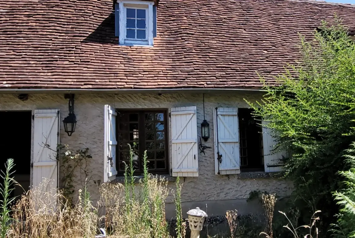 Ensemble de 2 maisons mitoyennes avec jardin et garage 