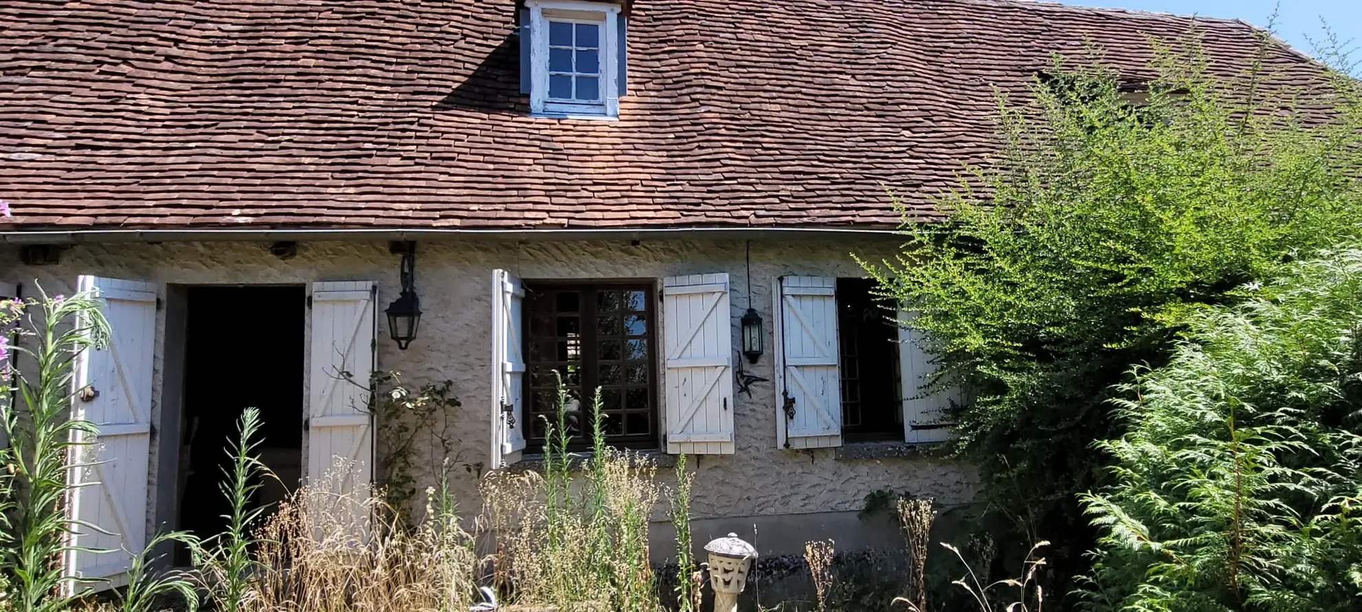 Ensemble de 2 maisons mitoyennes avec jardin et garage 