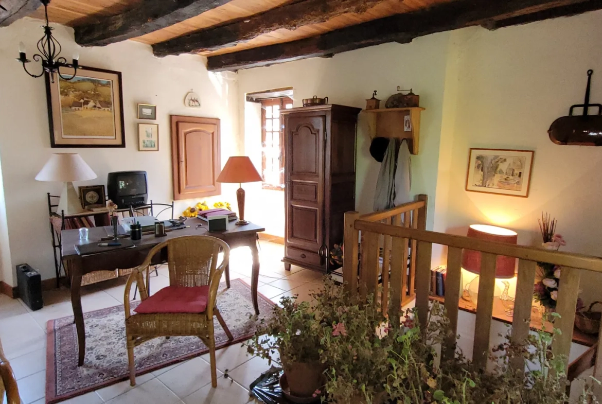 Ensemble de 2 maisons mitoyennes avec jardin et garage 