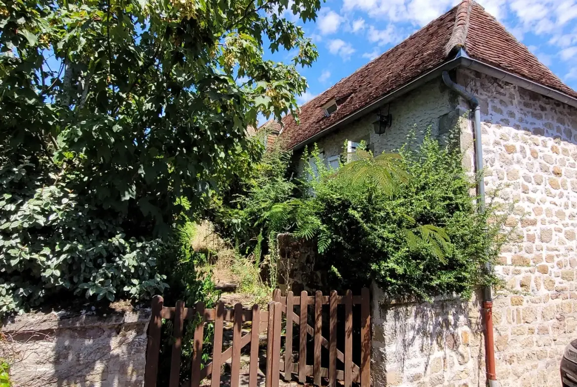 Ensemble de 2 maisons mitoyennes avec jardin et garage 