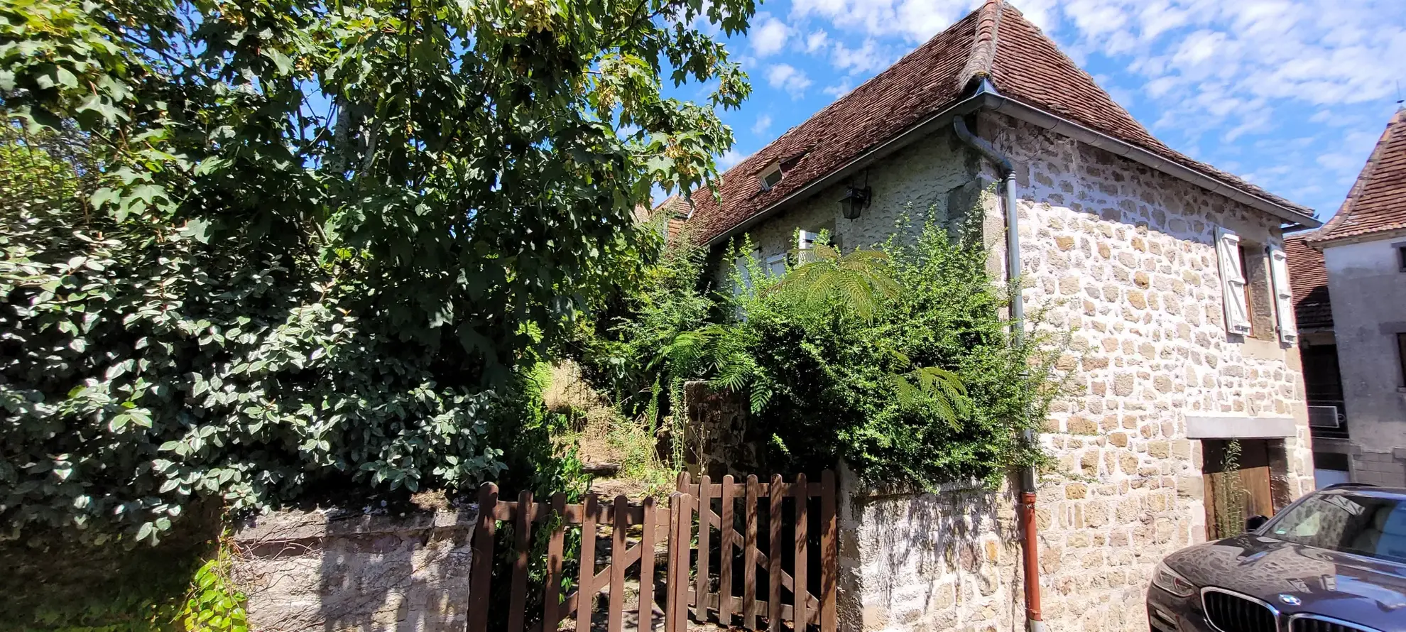 Ensemble de 2 maisons mitoyennes avec jardin et garage 
