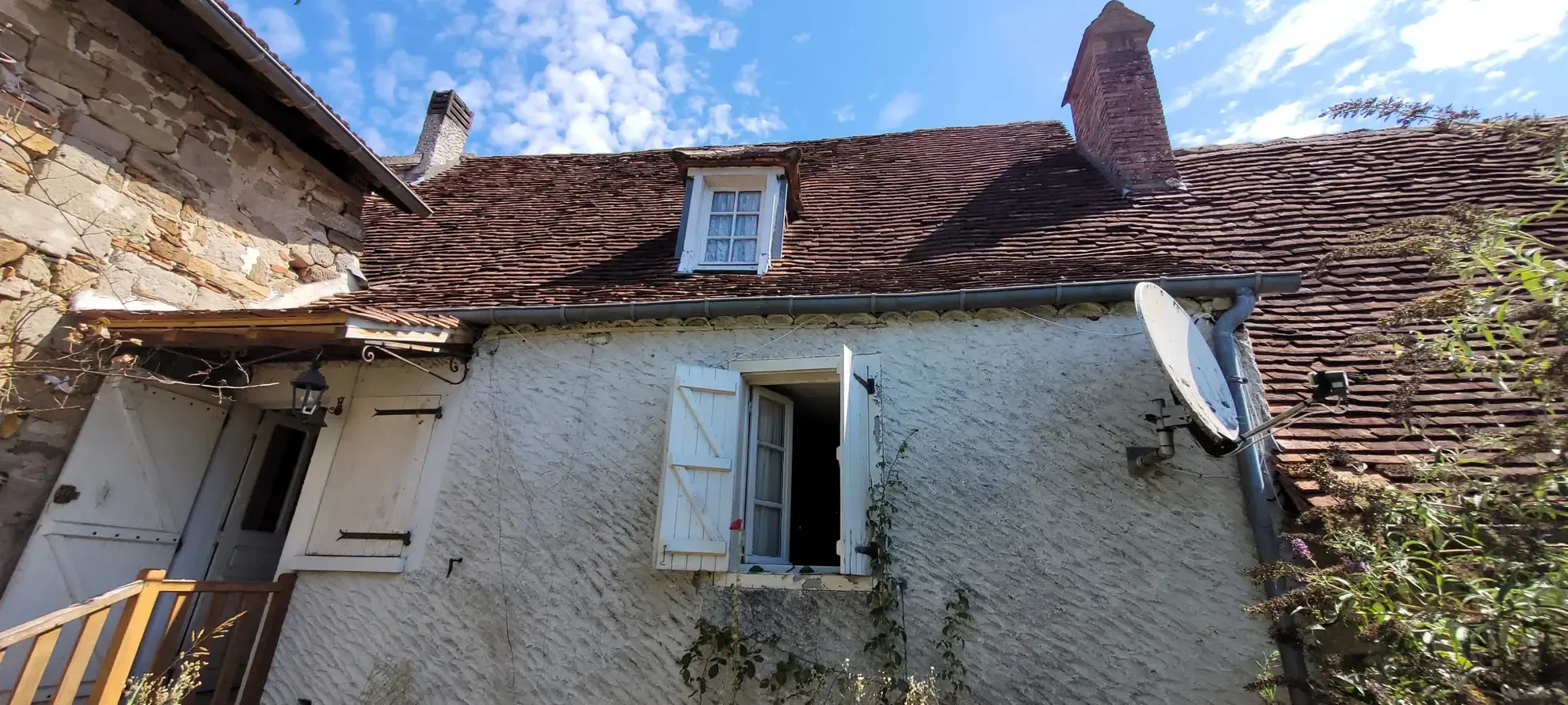 Ensemble de 2 maisons mitoyennes avec jardin et garage 