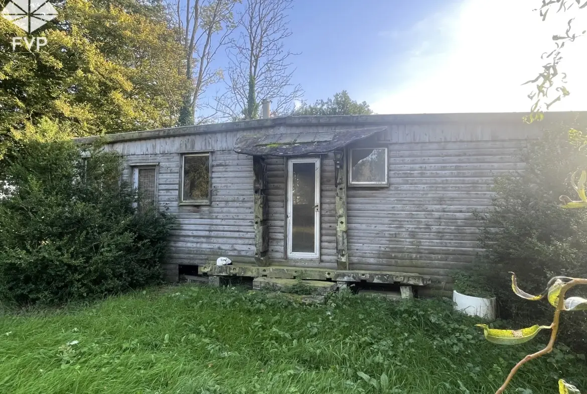 Bâtisse de 295m2 au sol sur 1ha7 