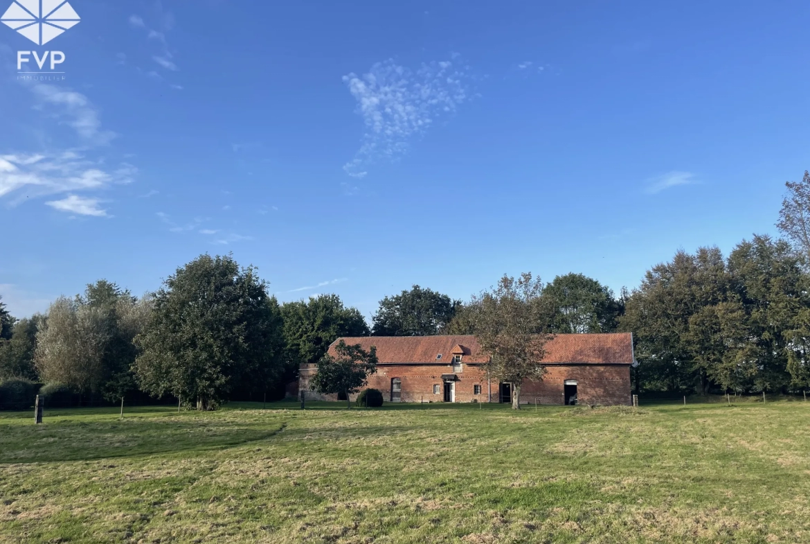 Bâtisse de 295m2 au sol sur 1ha7 