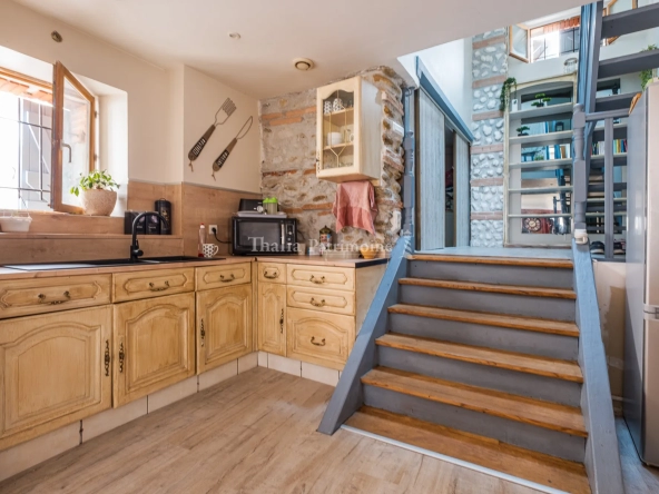 Immeuble d'habitation avec local commercial et appartement duplex à Cintegabelle 