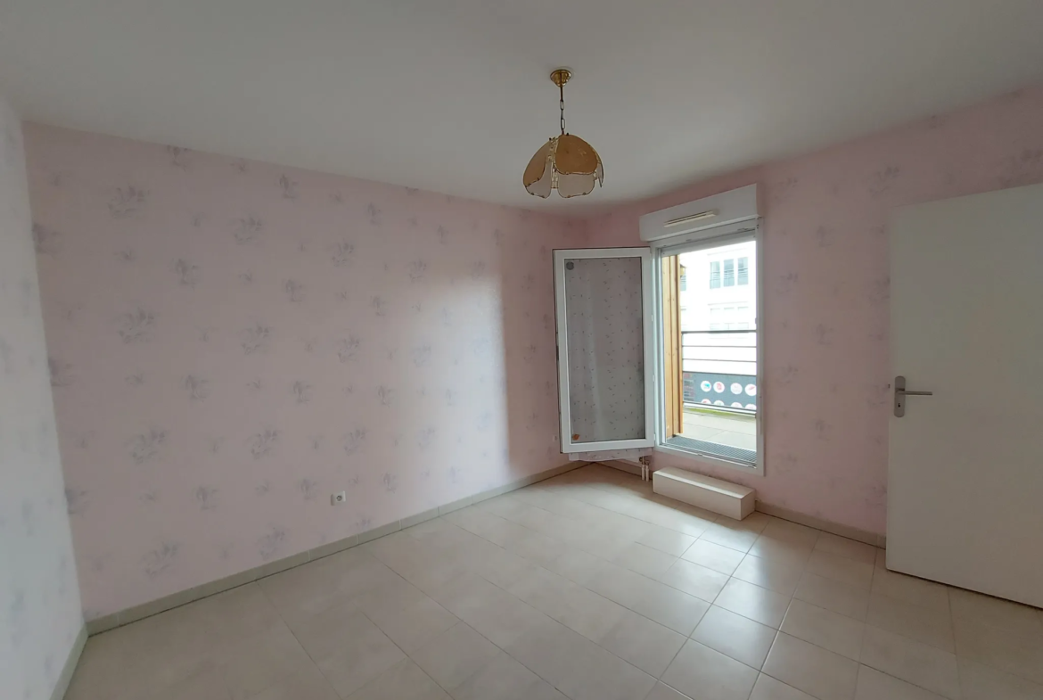 À vendre : Appartement 2 pièces avec balcon à Rosny-Sur-Seine 