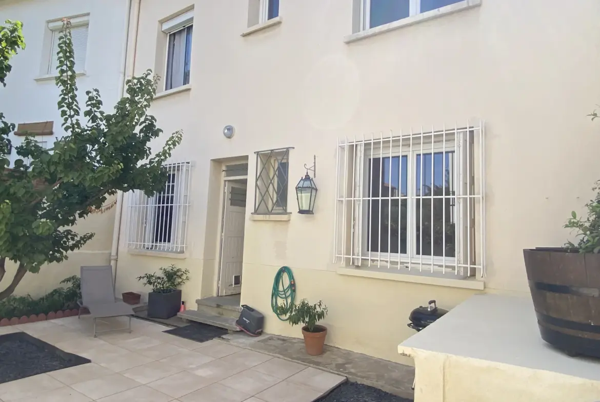Maison de ville avec jardin et garage à Perpignan 