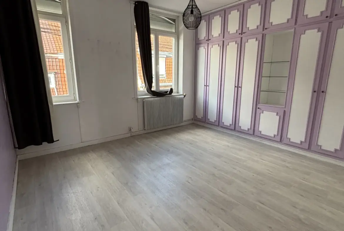 Maison familiale semi-individuelle - 3 chambres avec jardin à Hem 