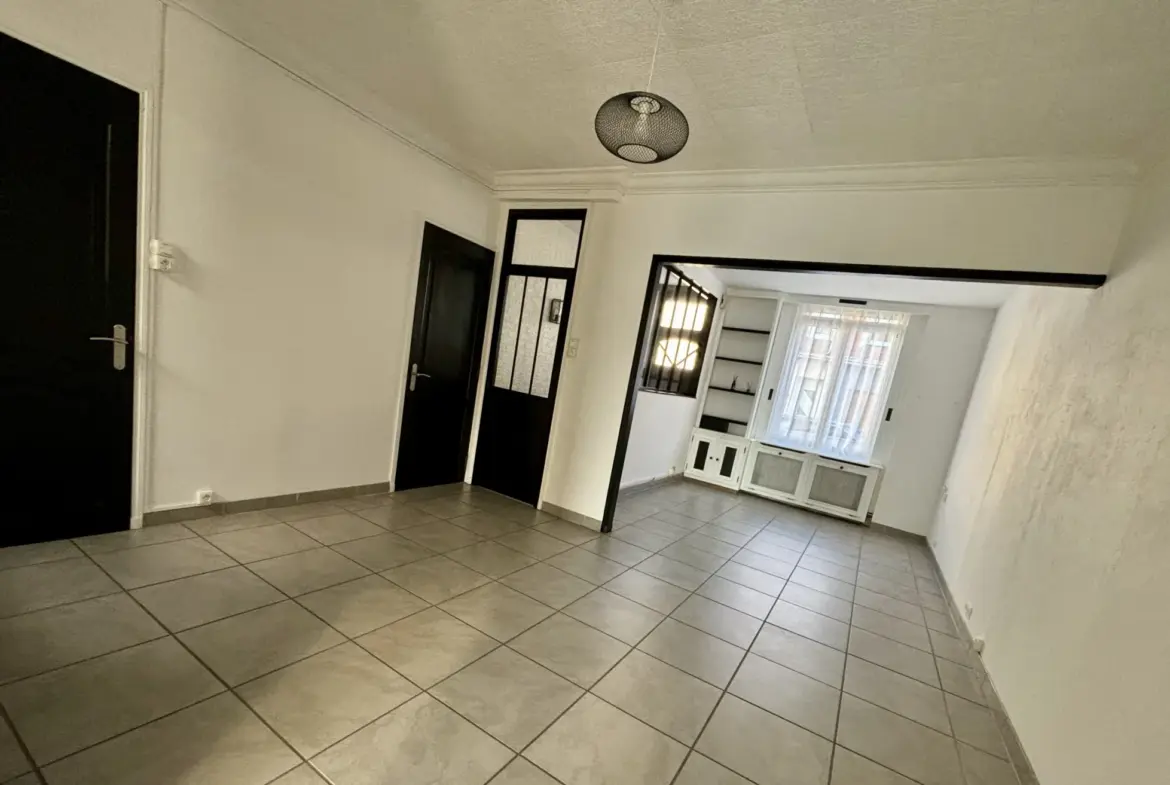 Maison familiale semi-individuelle - 3 chambres avec jardin à Hem 