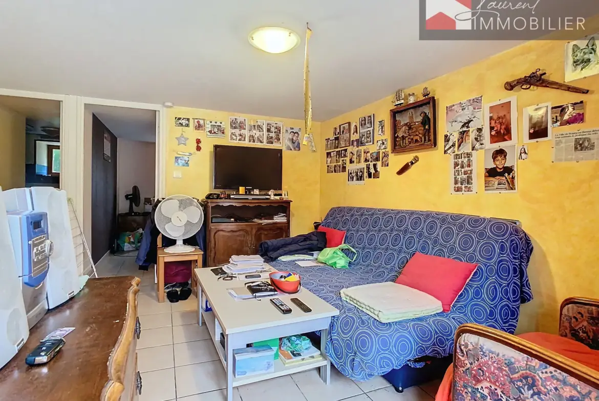 À Nanton : Maison en pierre en viager à vendre à 48 600 € 