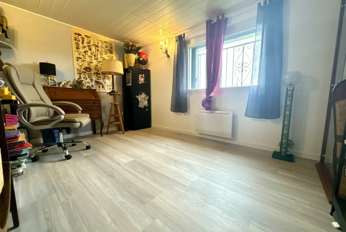 Maison en pierre avec 4 chambres et jardin spacieux à Saint-Sylvestre-sur-Lot 