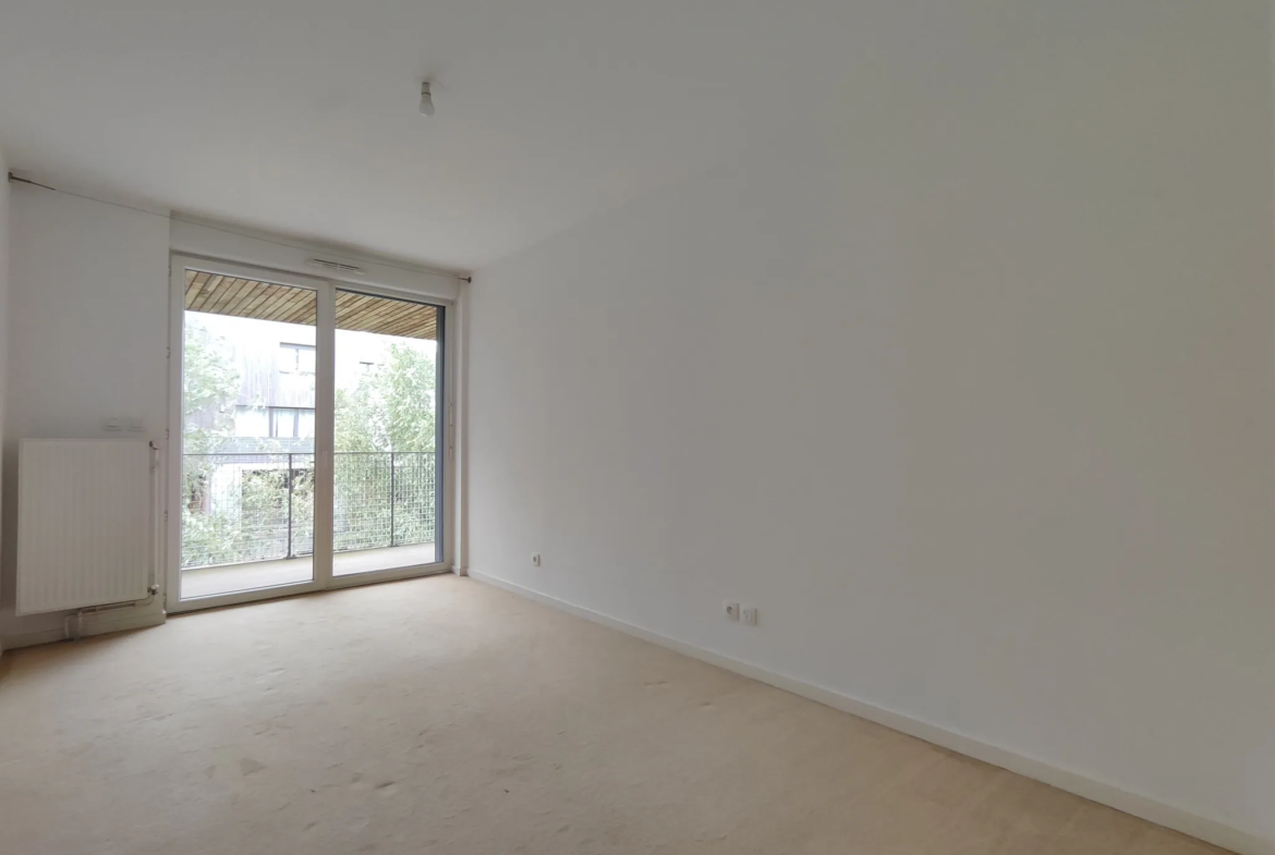Appartement T4 à Lille Moulins avec balcons et place de parking 