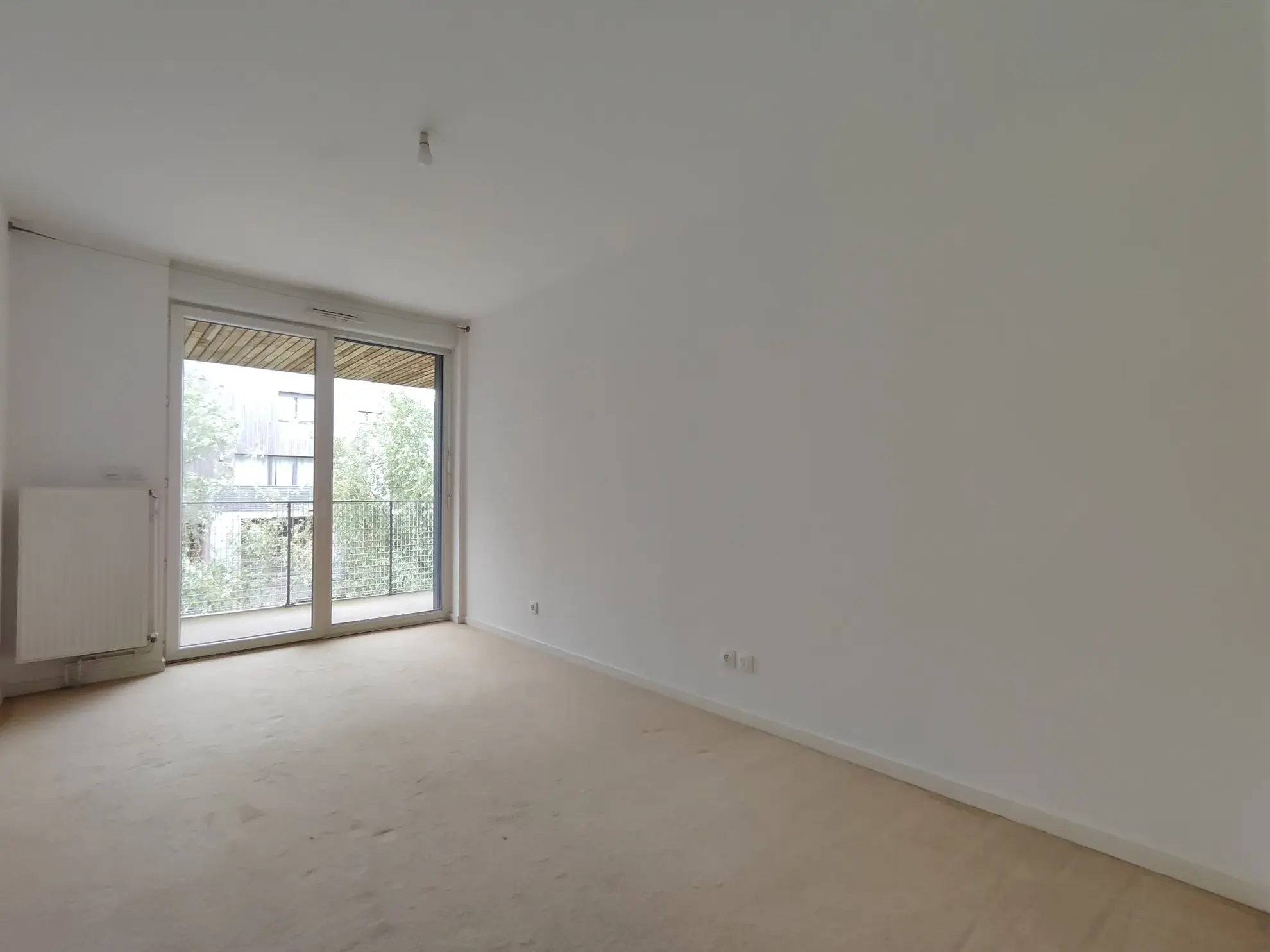 Appartement T4 à Lille Moulins avec balcons et place de parking 