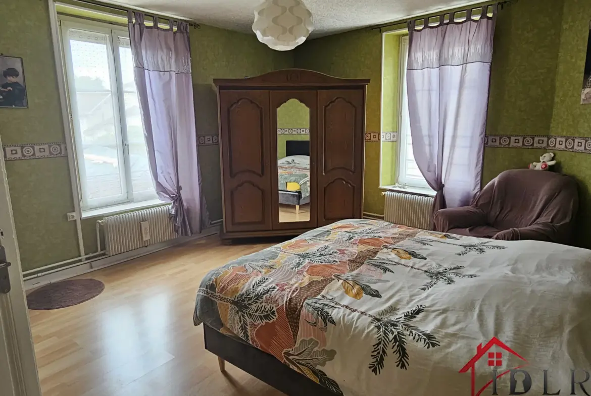 Maison mitoyenne à vendre à Wassy - 149 m² avec jardin et garage 