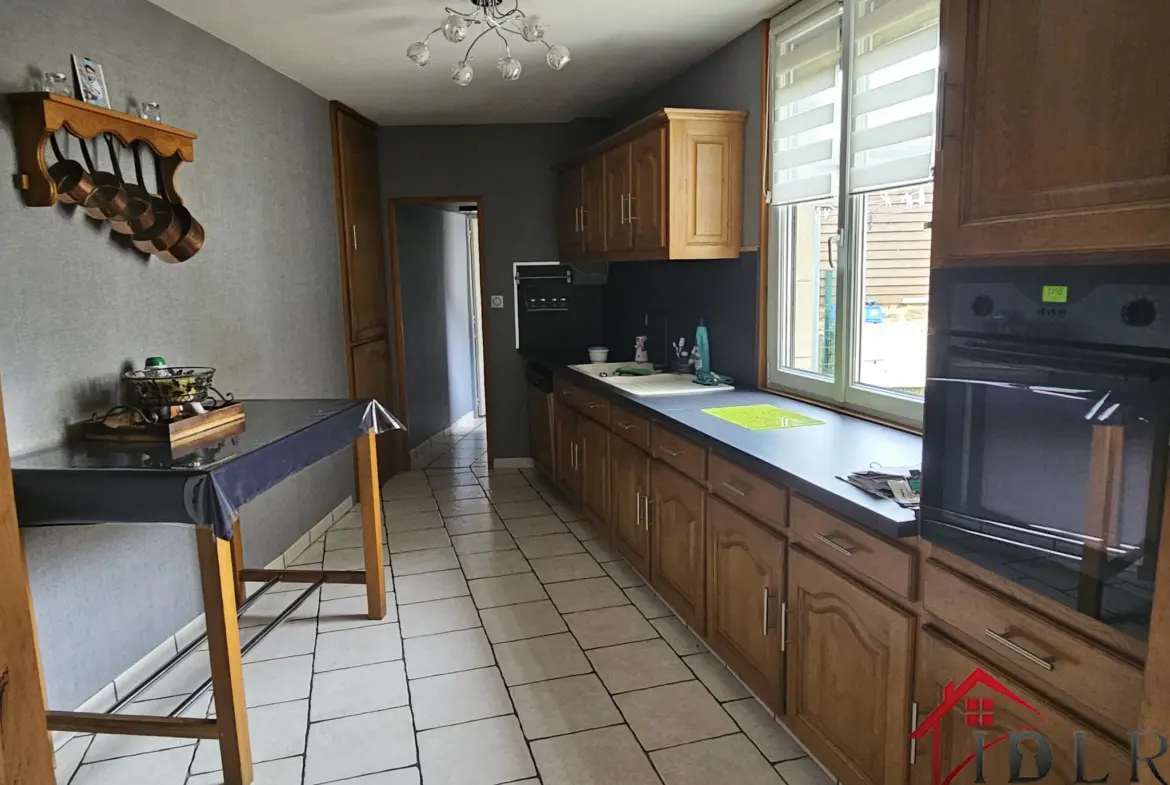 Maison mitoyenne à vendre à Wassy - 149 m² avec jardin et garage 