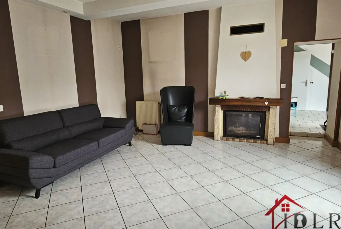Maison mitoyenne à vendre à Wassy - 149 m² avec jardin et garage 