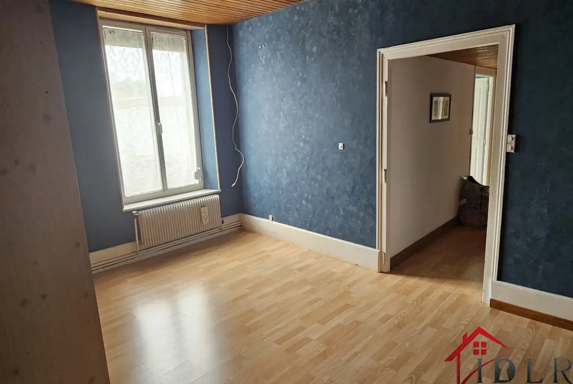 Maison mitoyenne à vendre à Wassy - 149 m² avec jardin et garage 