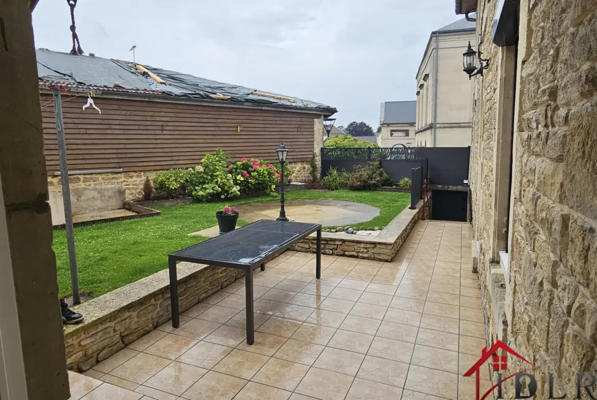 Maison mitoyenne à vendre à Wassy - 149 m² avec jardin et garage 