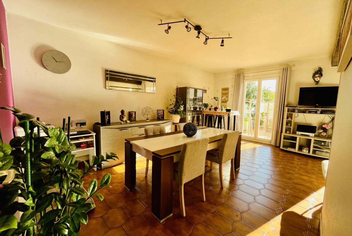 Maison familiale avec terrasse et garage à Perpignan 