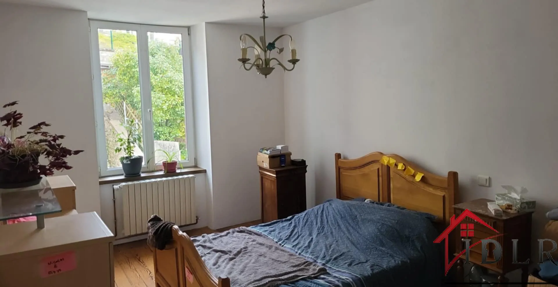 Immeuble d'habitation avec unité commerciale à Bourbonnes-les-Bains 