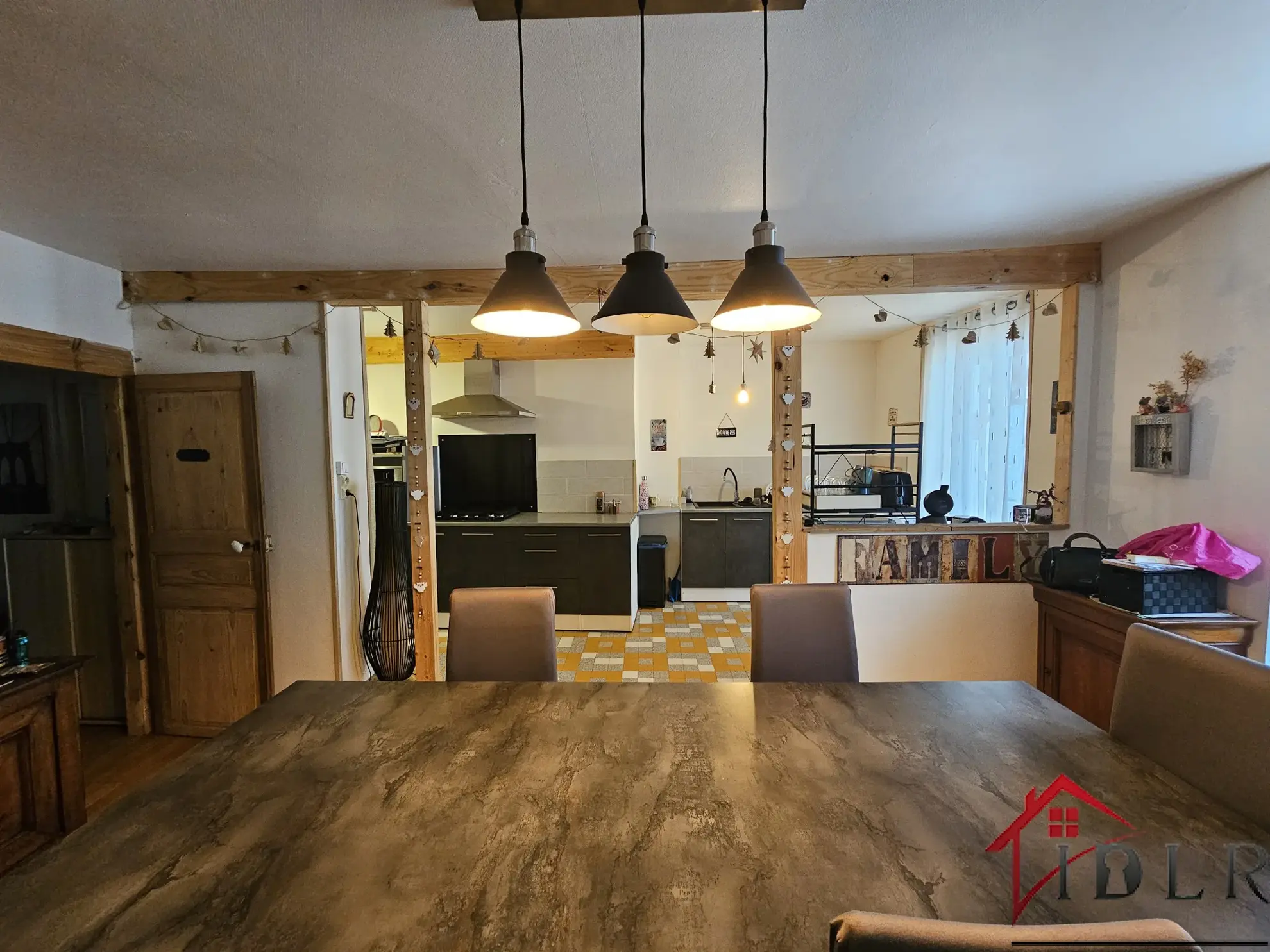 Immeuble d'habitation avec unité commerciale à Bourbonnes-les-Bains 