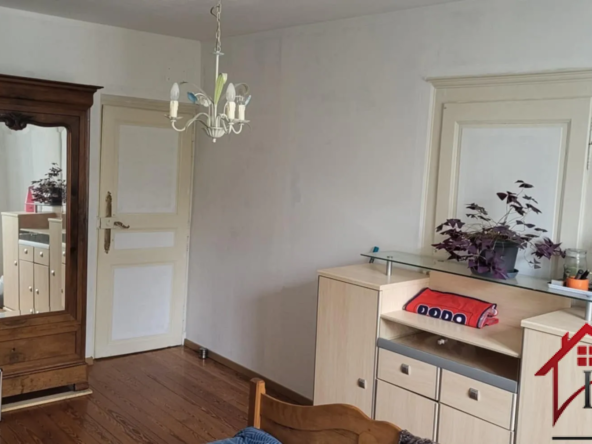 Immeuble d'habitation avec unité commerciale à Bourbonnes-les-Bains 