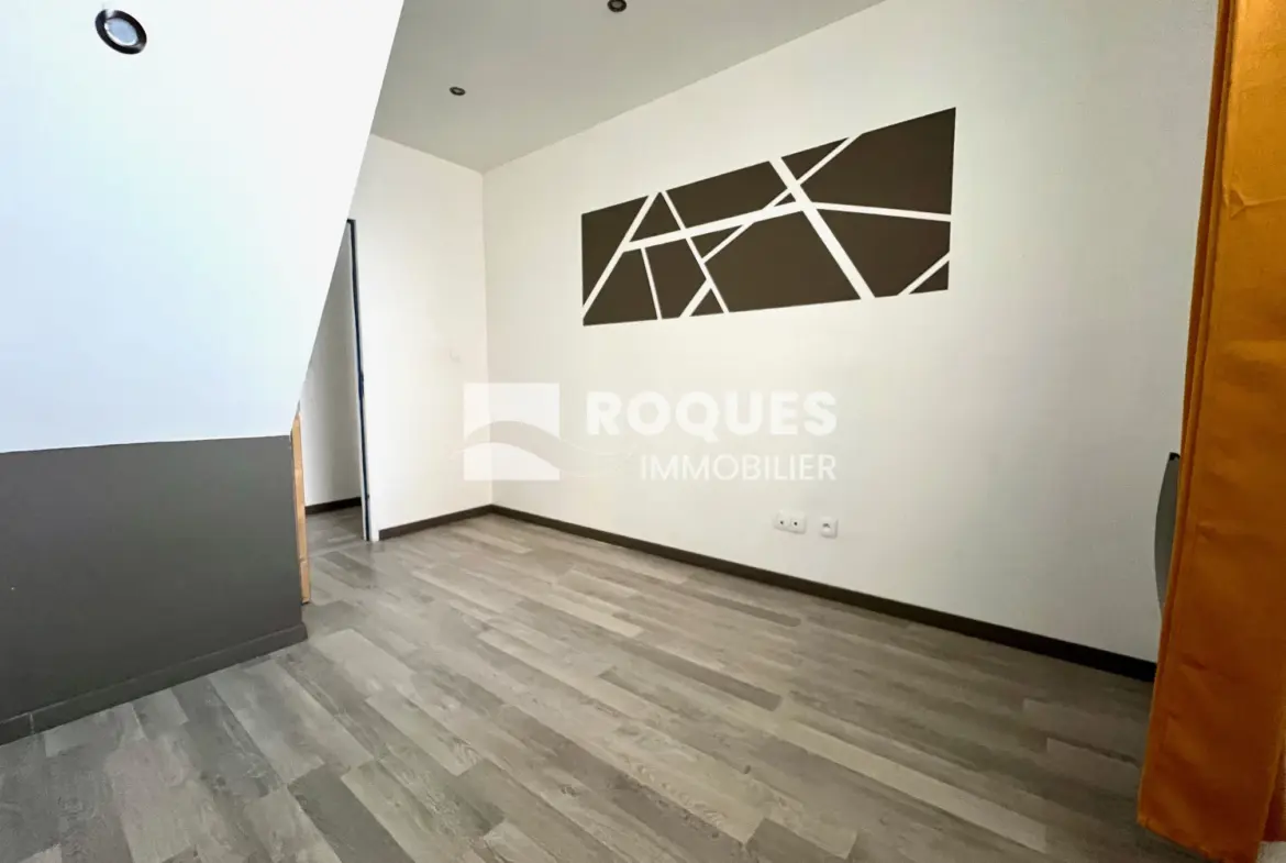 Appartement T3 duplex avec grande terrasse de 100 m² à Millau 