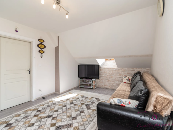 Vente de 2 appartements à Pontarlier avec jardin et garages 