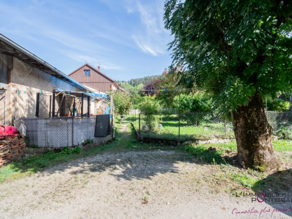 Vente de 2 appartements à Pontarlier avec jardin et garages 