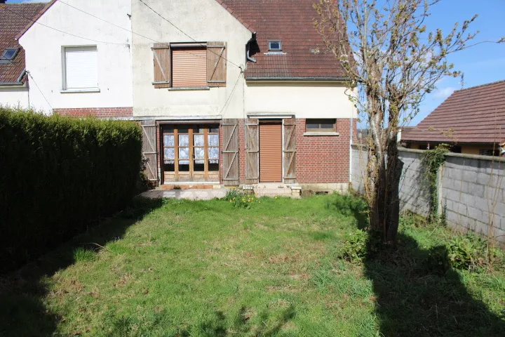 Maison avec sous-sol complet, garage et jardin à Beaucamps le Vieux 