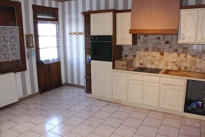 Maison avec sous-sol complet, garage et jardin à Beaucamps le Vieux 