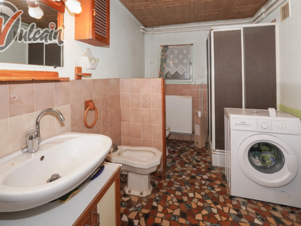 Maison de ville sur 1150 m² de terrain à Maringues 