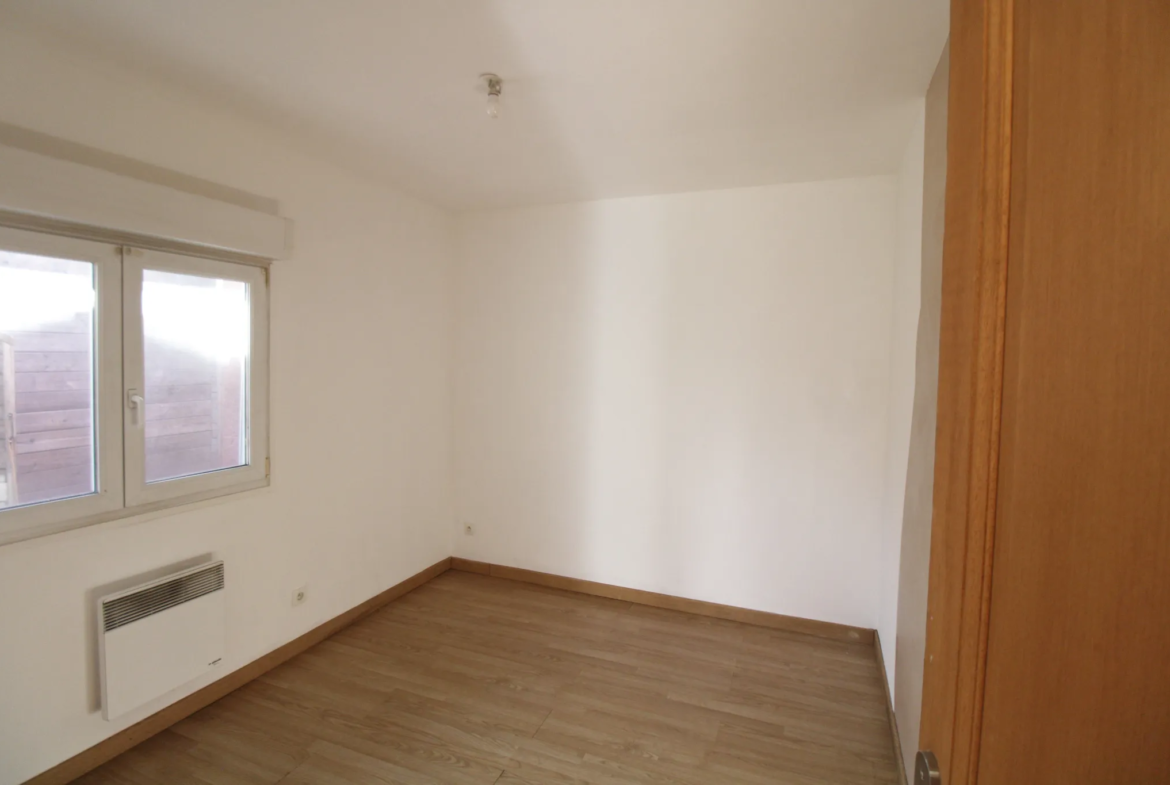 Appartement T3 en rez-de-chaussée avec jardin à Wattignies 